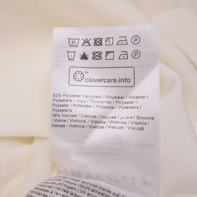 Materiallapp visar blandning av polyester och viskos