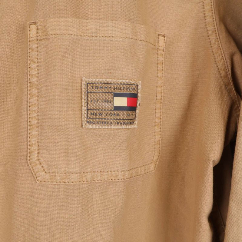 Beige jacka med bröstficka och liten Tommy Hilfiger-logga