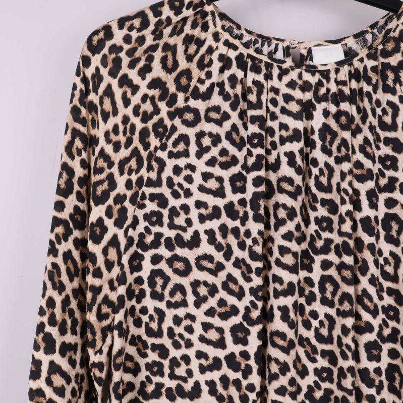 Övre del av leopardmönstrad klänning