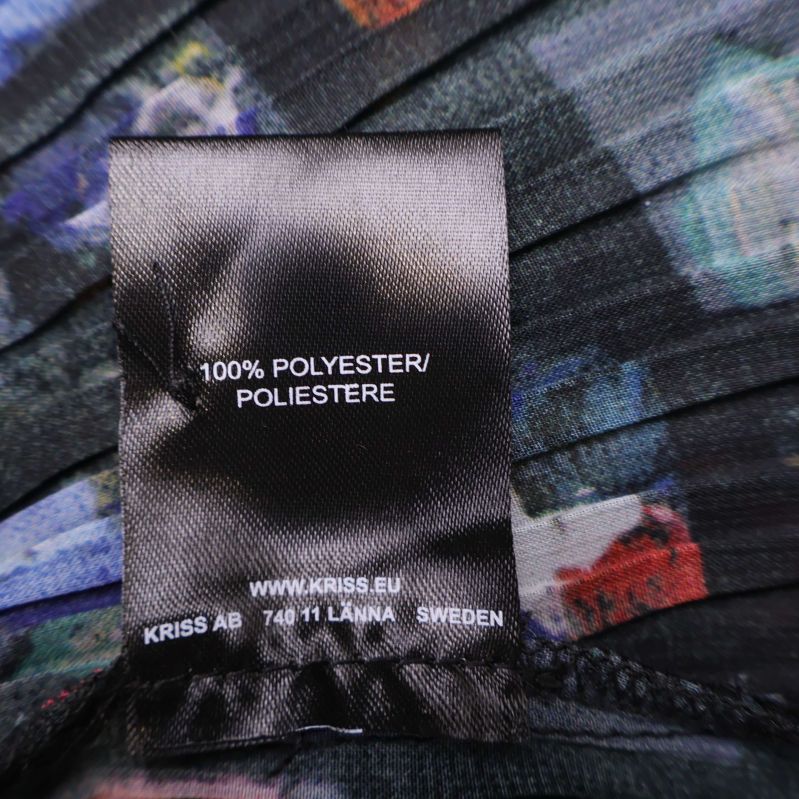 Materiallapp med text 100% polyester