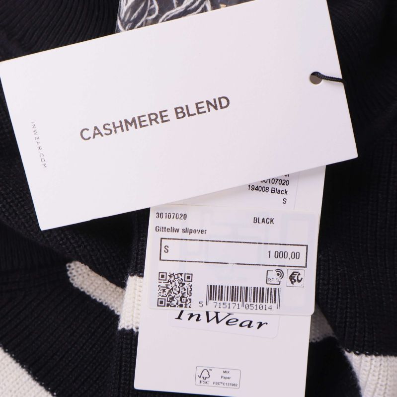 Etikett med text cashmere blend och InWear