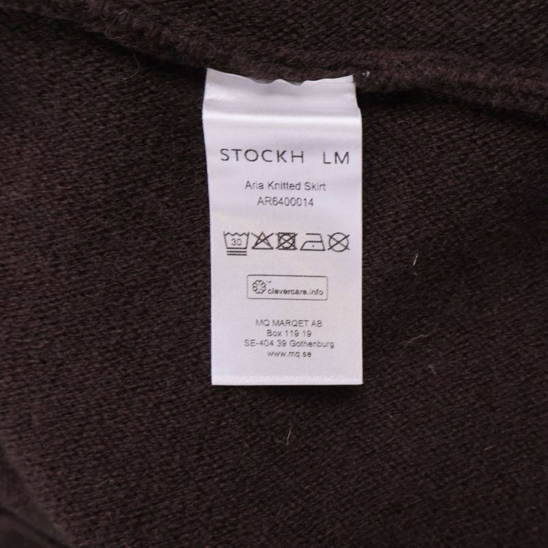 Material- och tvättrådsetikett från Stockh lm