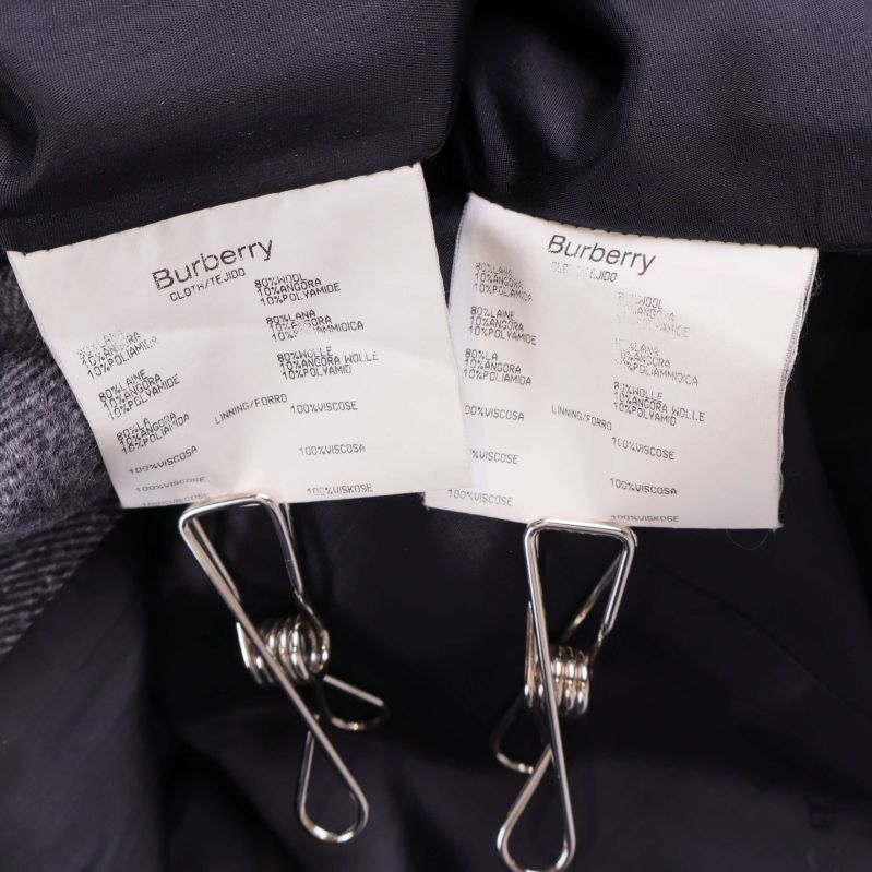 Materialetiketter från Burberry med sammansättning och tvättråd
