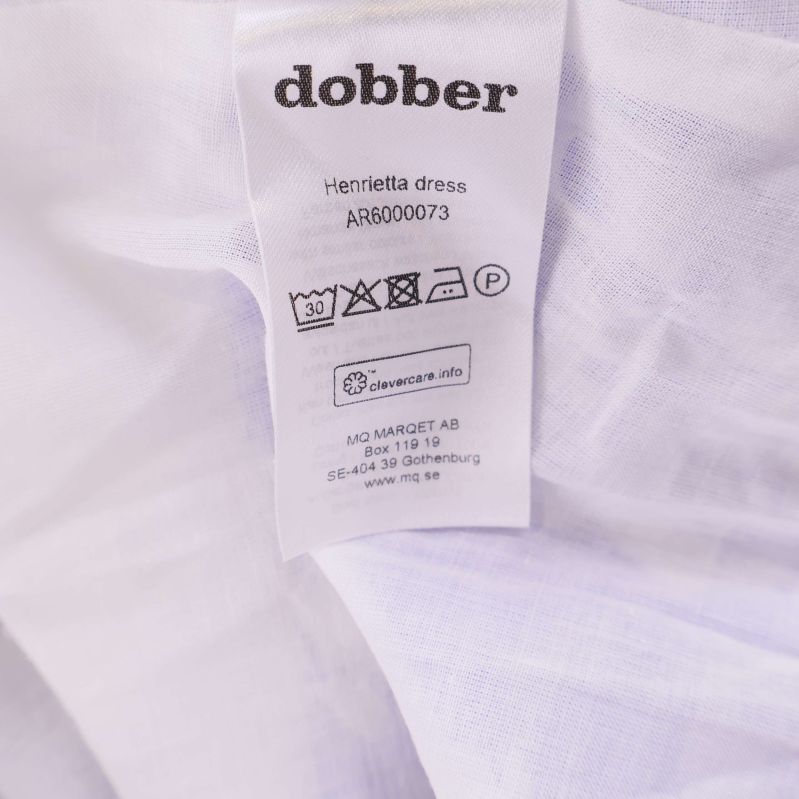 Vård- och materialetikett för dobber Henrietta dress