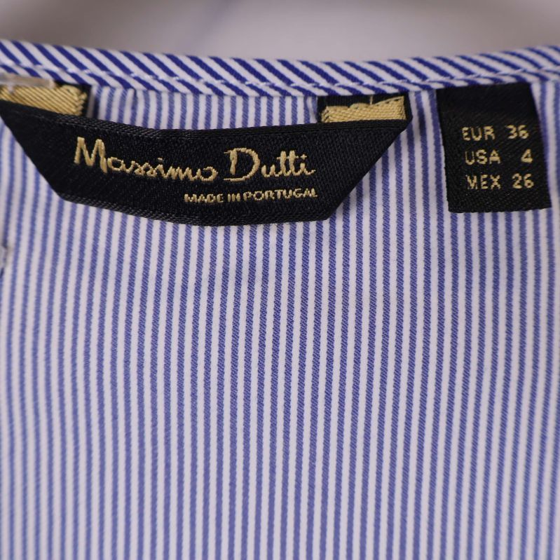 Etikett med Massimo Dutti och storlek 36 synlig