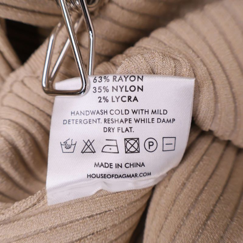 Materiallapp som visar rayon, nylon och lycra