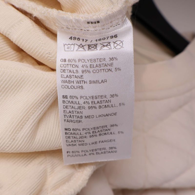 Materialetikett med sammansättning i polyester, bomull och elastan