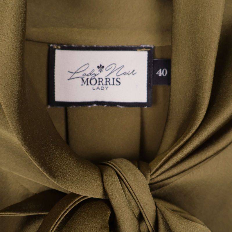 Närbild av klänningsetikett, Lady Noir Morris Lady storlek 40