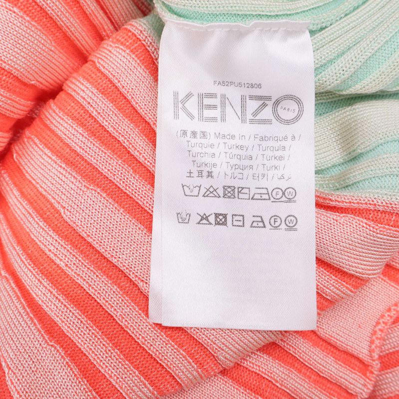 Materiallapp inuti tröjan med Kenzo-logo och tvättråd