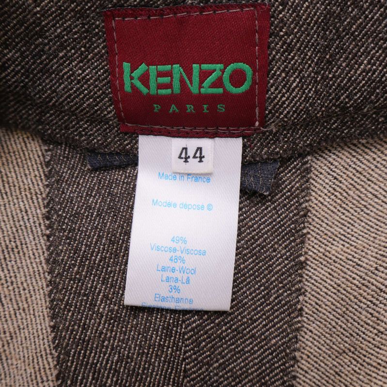 Närbild på storlekslapp Kenzo med materialinnehåll