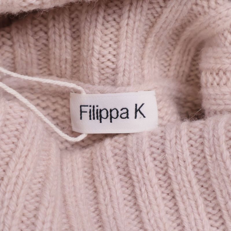 Märkt etikett med Filippa K-logotyp