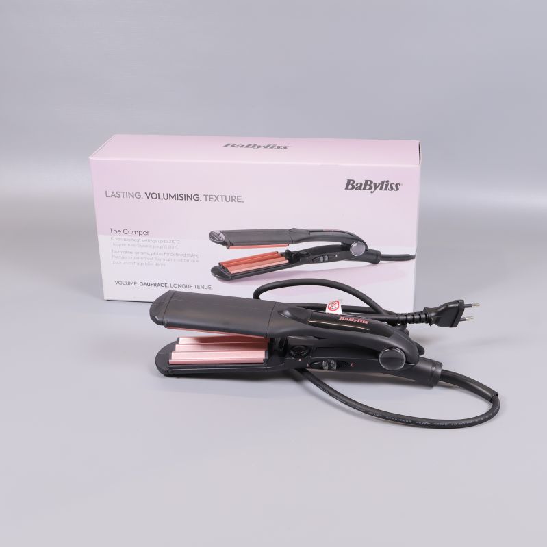 BaByliss våffeltång framför sin originalförpackning