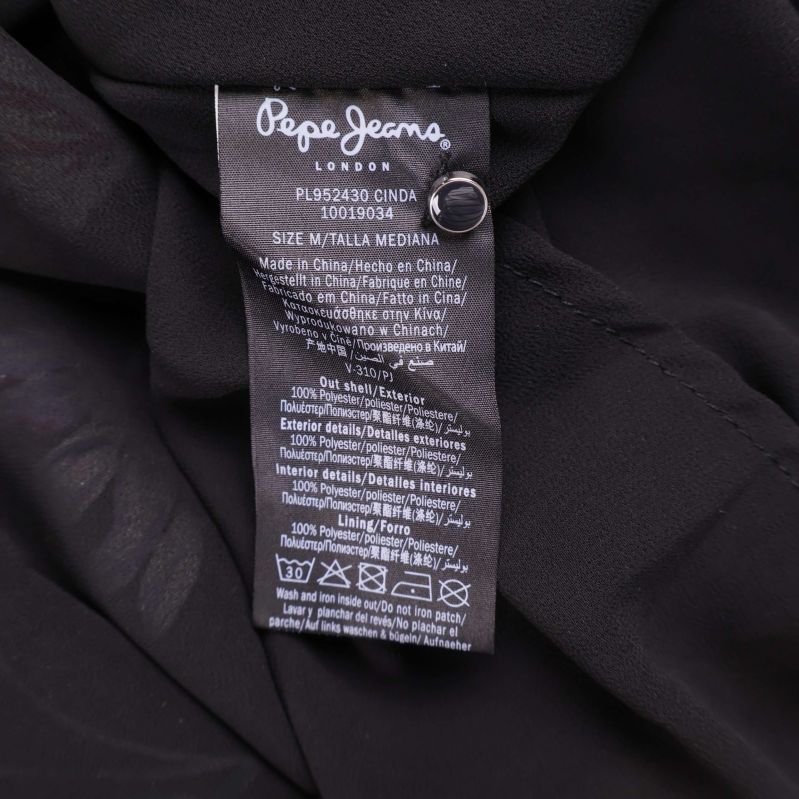 Material- och tvättetikett för Pepe Jeans klänning
