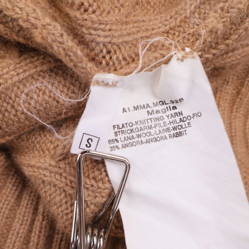 Materiallapp visar 65% ull och 35% angora