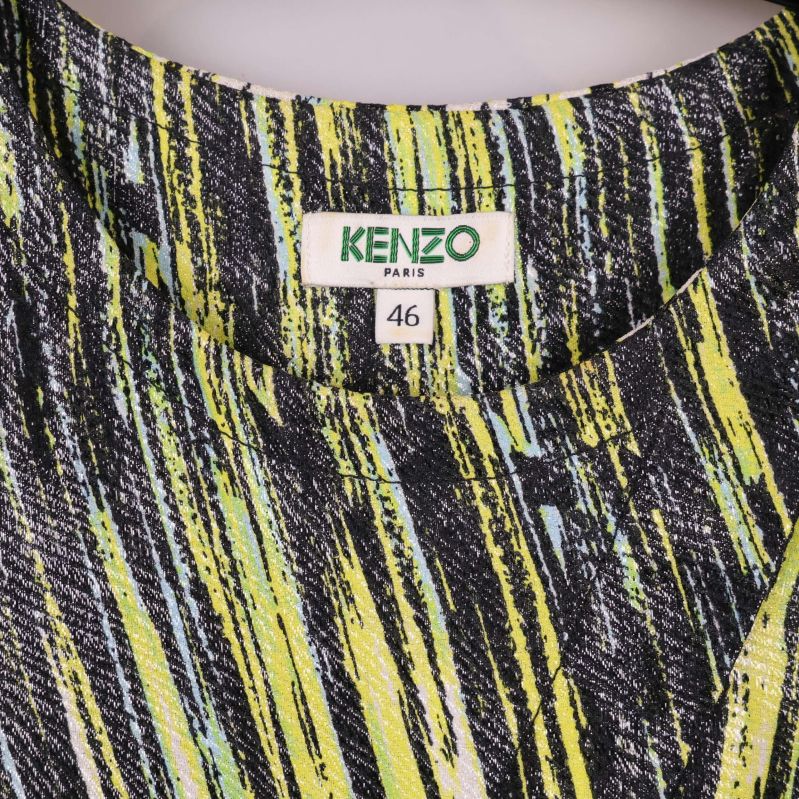 Närbild på Kenzo Paris-märket och storlek 46