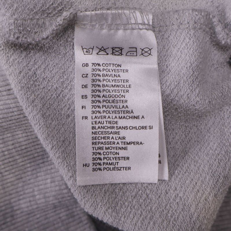 Materiallapp visar 70% bomull och 30% polyester