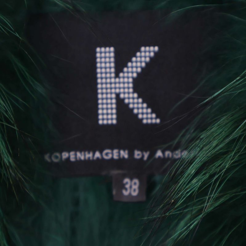 Storleks- och märkesetikett med K Copenhagen by Andersen 38
