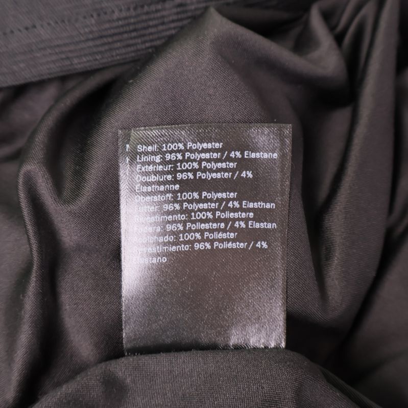 Materiallapp med information om polyester och elastan