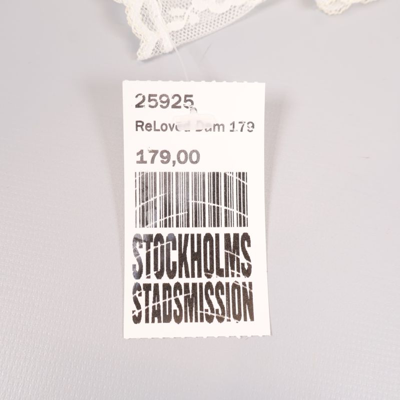 Prislapp med Stockholms Stadsmission logotyp och streckkod