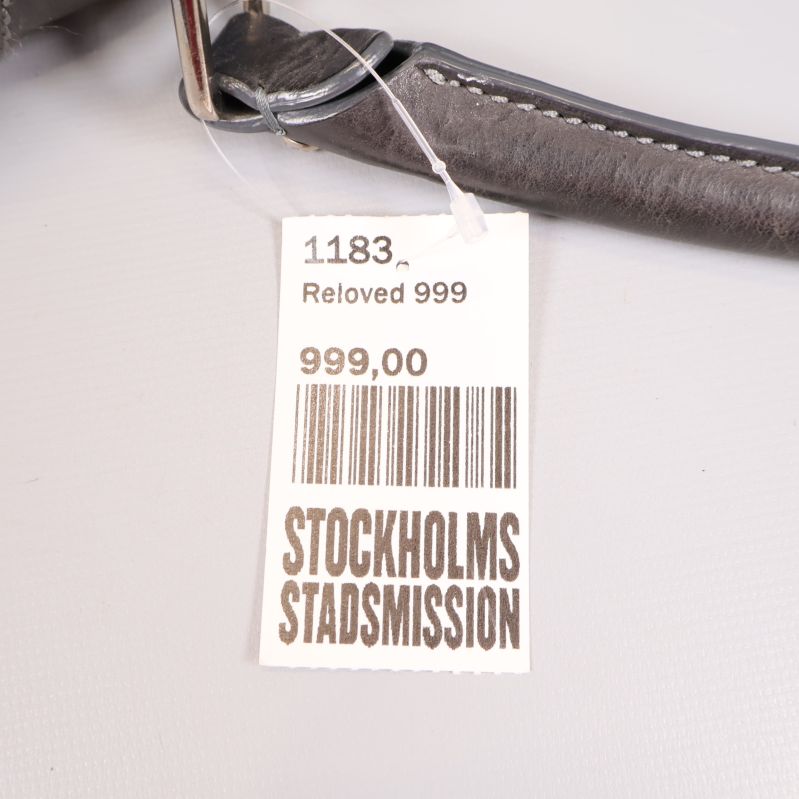 Prislapp med text Stockholms Stadsmission